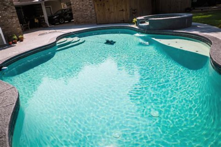 Does a swimming pool look shallower than it is?