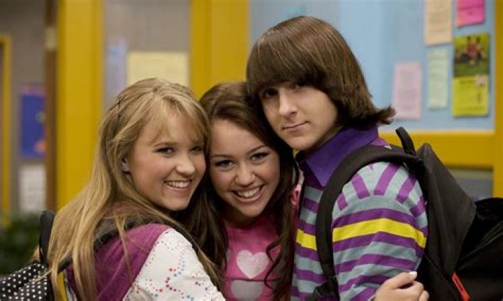 Does emily osment sing?